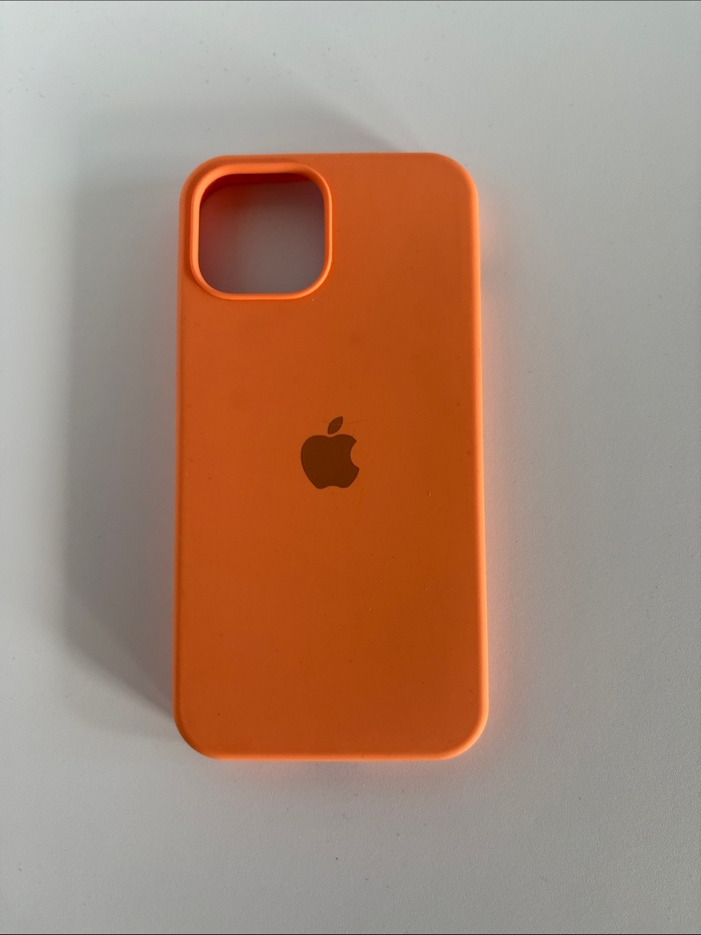 Apple iPhone 13 mini case in Orange Silicone.